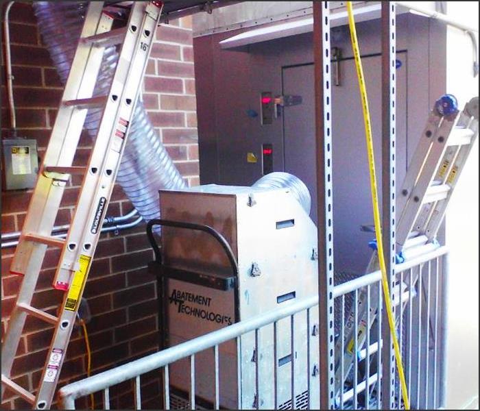 HVAC duct cleaning equipment setup