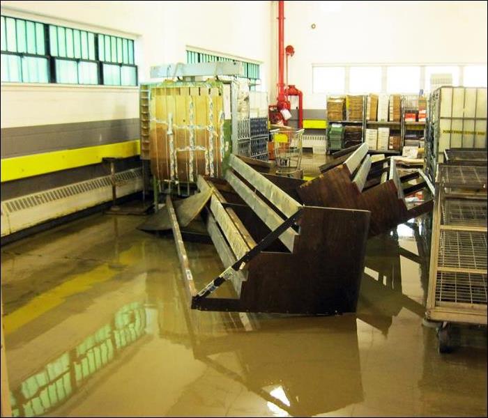 storage room with water covering the floor